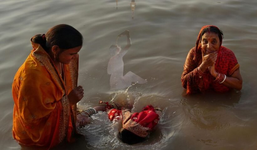 Women bathe heads